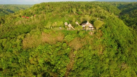 Aerial view of amok sunset bar and restaurant in nusa penida Stock Footage 336593334