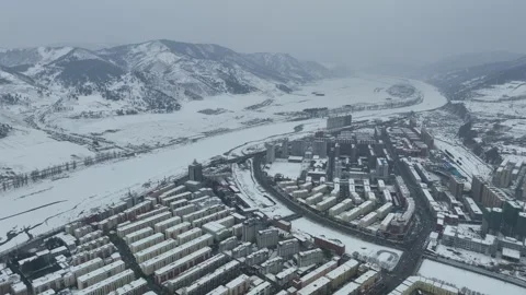 Aerial view of Amrok River landscape from Linjiang City china in winter Stock Footage 266972401