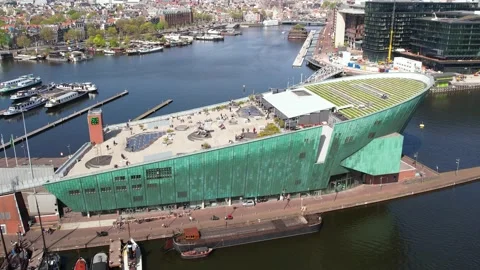 Aerial view of Amsterdam and NEMO Science and technology Museum Stock Footage 193957361