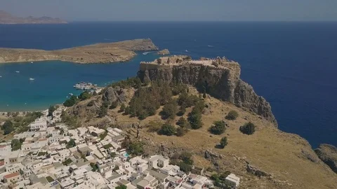 Aerial view of ancient Acropolis and village of Lindos Stock Footage 80373545