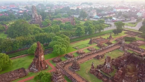 Aerial View of Ancient Brick Temples and Structures in Lush Green Landscape 스톡 동영상 310991723