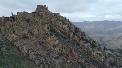 Aerial view ancient ghost town Gamsutl with abandoned stone buildings, Caucasus Video stock 196160166