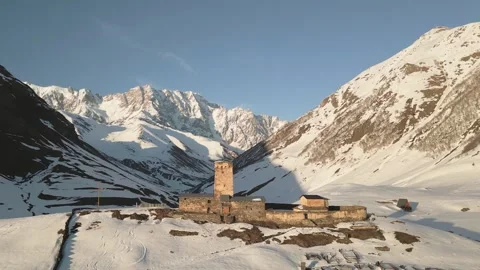 Aerial view ancient Lamaria Monastery in snowy highland valley, surrounded .. Vídeos de archivo 311999850