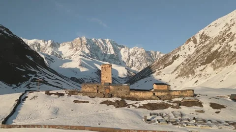 Aerial view Ancient Lamaria Monastery in snowy highland valley, surrounded .. Vídeo Stock 312061607