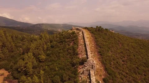 Aerial view of Ancient Messini wall ruins Video stock 143947227