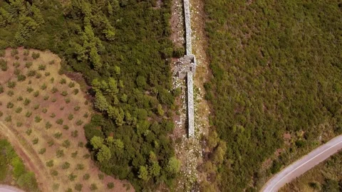 Aerial view of Ancient Messini wall ruins Stock Footage 195551231