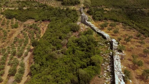 Aerial view of Ancient Messini wall ruins Stock Footage 196263154