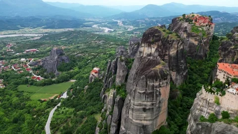 Aerial View of Ancient Monasteries Perched on Famous Meteora Cliffs Stock Footage 335324662