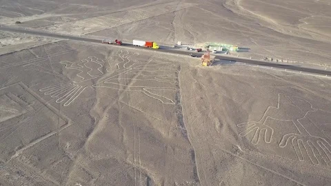 Aerial view of Ancient Nazca Lines. The Tree and The Hands. Rocky Desert. Stock Footage 78958382