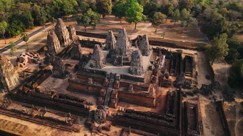 Aerial view of the ancient pre rup hindu temple. Warm sunset light illuminating Stock Footage 322521386