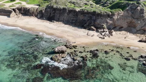 Aerial view of ancient ruins and beach at Ashkelon National Park in Israel Video stock 325732425