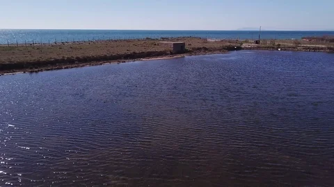 Aerial view, Ancient salt flats near the sand beach at Tarquinia  Stock Footage 106528004