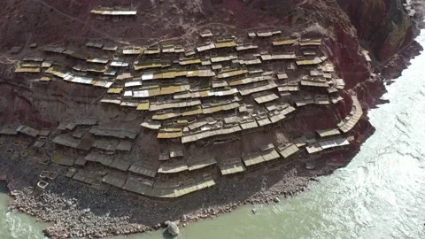 Aerial View of Ancient Salt Making Fields in Yanjing, Tibet, along Jinsha River Video stock 344886312