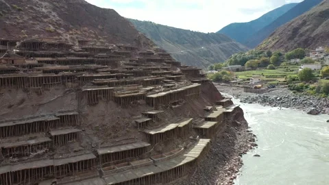 Aerial View of Ancient Salt Making Fields along Jinsha River in Tibet, China Vídeos de archivo 344886325