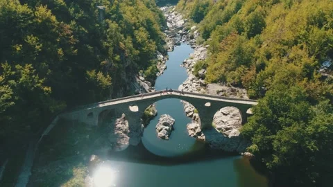 Aerial view of An ancient stone bridge called Devil's bridge Ardino Bulgaria Vídeo Stock 139682682