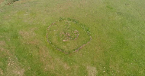 Aerial view of ancient stone circle on green hill in Mpumalanga South Africa  Stock-Footage 85958852