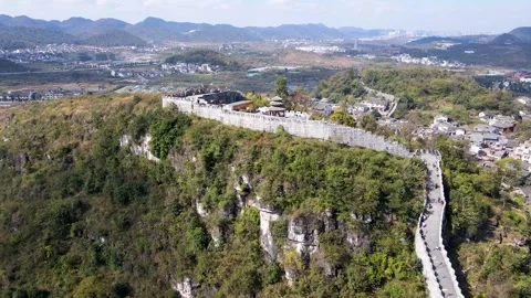 Aerial View of Ancient Stone Fortification Wall in Mountain Scenery Video stock 341910205