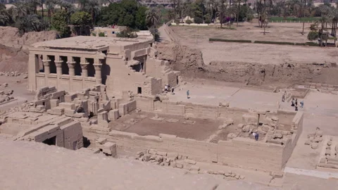 Aerial view of ancient stone temple complex in Dendera, Egypt under clear skies Stock Footage 310214148