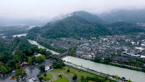 Aerial View of Ancient Town Mountain and River Panorama in Dujiangyan China Stock Footage 337927249