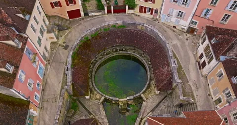 Aerial view of ancient town of Tonnerre with unusual water reservoir Fosse Stock-Footage 315513622