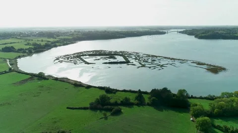 Aerial view of an ancient viking camp in Saint-Suliac bay in october 03 Stock Footage 296889088