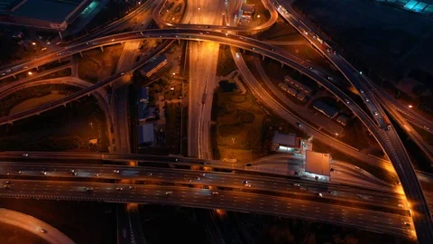 Aerial view and Top view. Traffic of expressways at night, motorways and highway Видео 108270635