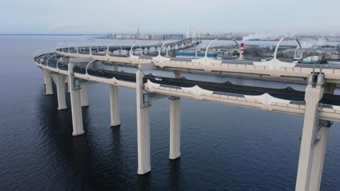 Aerial view and uphill under bypass highway standing on columns at sea bay. Stock Footage 165211003