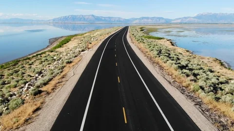 Aerial view of the Antelope Island Rd at the Great Salt Lake, Utah, USA Stock Footage