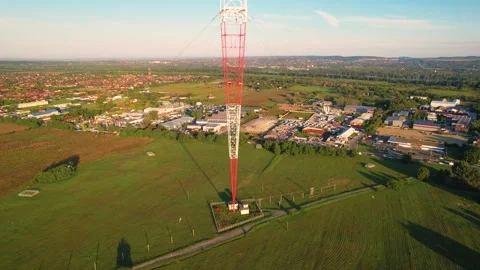 Aerial view of antenna in the middle of fields 4k 25fps 動画素材 249546544