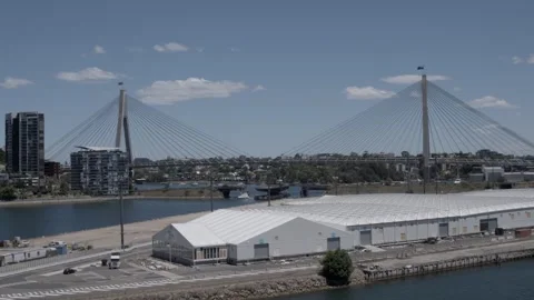 Aerial View of Anzac Bridge Spanning Waterway in Sydney on Clear Day Stock Footage 341315085