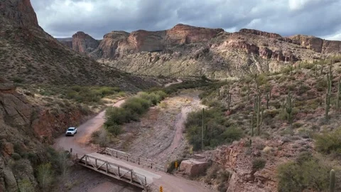 Aerial view of Apache Trail winding through canyon, United States. Video stock 312759979