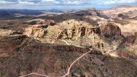 Aerial view of Apache Trail winding through mountains, United States. Stock Footage 312759998