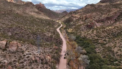 Aerial view of Apache Trail winding through mountains, United States. Video stock 312760043