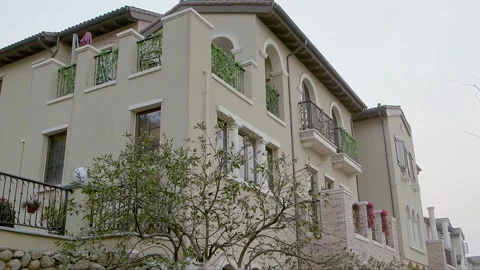 Aerial view of the appearance of the villa during the day Stock Footage 261642074