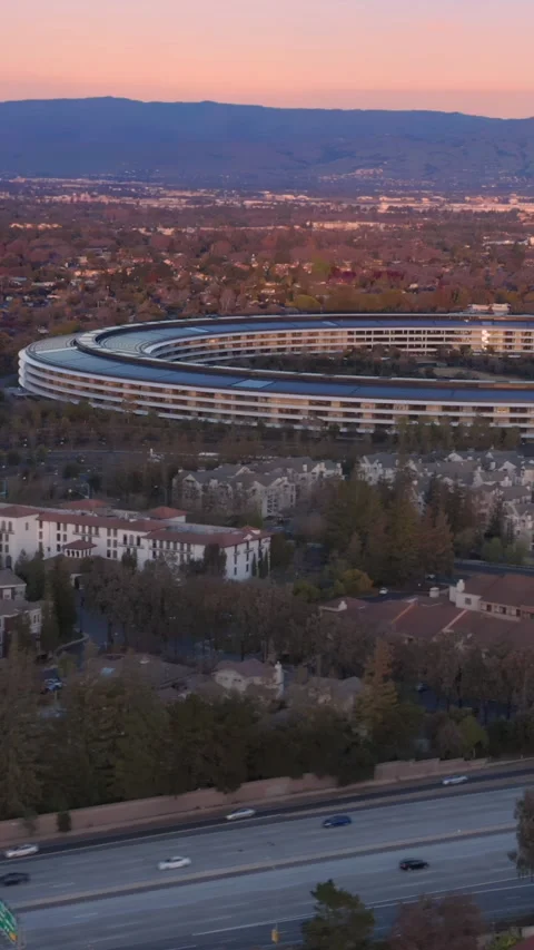 Aerial view of Apple Park, Silicon Valley, at sunset. Cupertino, USA Stock Footage 313853776
