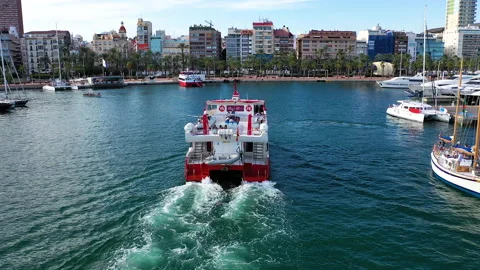 Aerial view with approach yo beauiful touristic ferry entering in Alicante Stock Footage 140879158