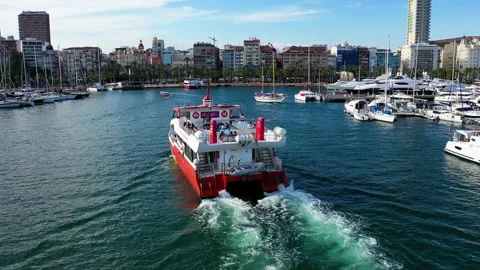 Aerial view with approach yo beauiful touristic ferry entering in Alicante. Stock Footage 140879319