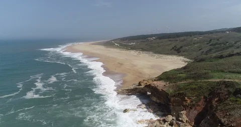 Aerial View approaching of the Beach coast In Portugal 4K Stock Footage 113011362