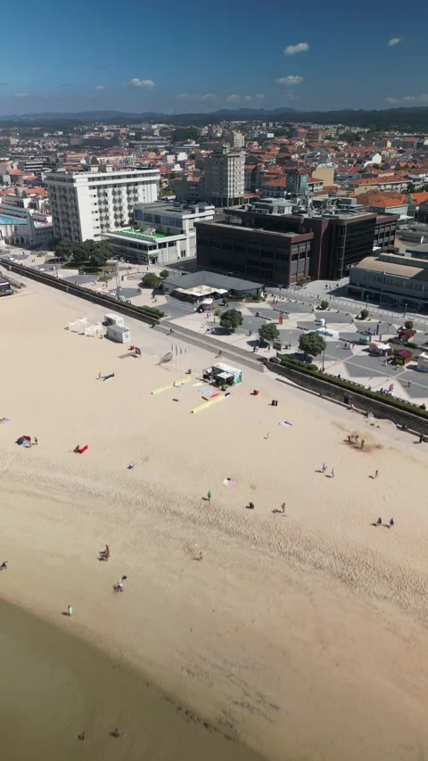 Aerial view approaching the boardwalk in Espinho, Portugal Stock Footage 284088009