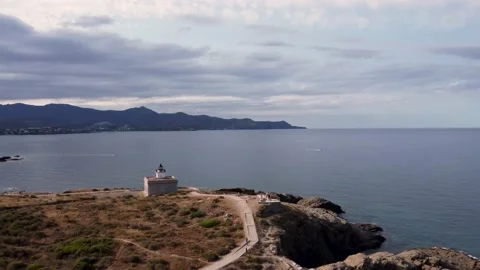 Aerial view approaching a lighthouse in Costa Brava, Catalonia, Spain Vídeos de archivo 190360323
