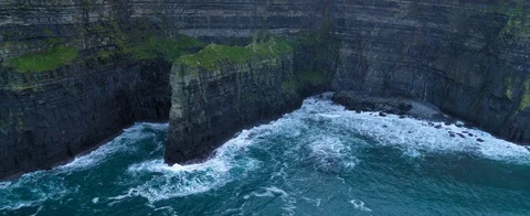 Aerial view approaching the mighty Cliffs of Moher from the sea. Stock Footage 127921933