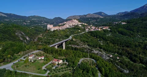 Aerial view, approaching movement, of the medieval city of Rivello in Basilicata Video stock 233429108