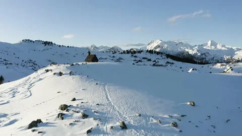 Aerial View of Approaching To Small Old Wooden Church On The Peak Of The hill. Stock Footage 168252483