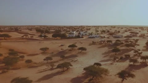 Aerial view approaching to a small town in Sahara Desert, West Africa Stock Footage 155720153