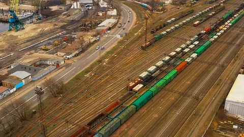 Aerial view, approaching train tracks, used to transport heavy stuff away 스톡 동영상 105901883
