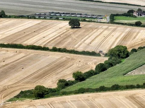 Aerial view of arable fields and a farm near Blandford in Dorset, UK Stock Photos