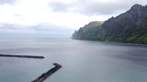 Aerial view of arctic ocean waves at Ersfjord beach in Senja Northern Norway Stock Footage 340508007
