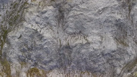 Aerial view of arctic permafrost microrelief and lichen stained rock landscape Stock Footage 327120563