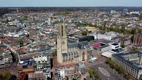 Aerial view of Arnhem city Eusebius church showing the tall medieval bell tower Stock Footage 223848172