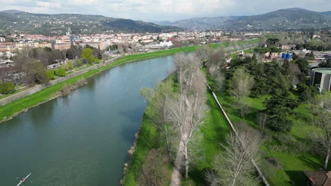 Aerial view of the Arno river in Florence, Italy. Video stock 330664899